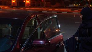 A Saudi woman gets ready to drive her car through the streets of Khobar City on her way to Kingdom of Bahrain. A little after midnight on June 24, 2018, Saudi law allowed women to drive. ending the world's only ban on female motorists.(AFP)