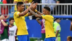 Brazil's midfielder Casemiro (L) and forward Neymar celebrate after winning the FIFA World Cup 2018 round of 16 match against Mexico.(AFP) Brazil's midfielder Casemiro (L) and forward Neymar celebrate after winning the FIFA World Cup 2018 round of 16 match against Mexico.(AFP)