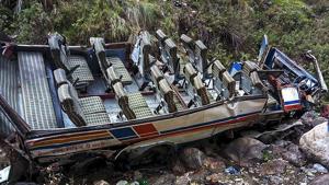 The mangled remains of a bus that fell into a gorge. At least 48 people were killed and 12 others injured in the accident.(PTI) The mangled remains of a bus that fell into a gorge. At least 48 people were killed and 12 others injured in the accident.(PTI)