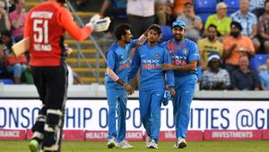 India's Kuldeep Yadav (2nd R) is congratulated after taking a catch to dismiss England's Jonny Bairstow during the second T20 at Sophia Gardens in Cardiff.(AFP) India's Kuldeep Yadav (2nd R) is congratulated after taking a catch to dismiss England's Jonny Bairstow during the second T20 at Sophia Gardens in Cardiff.(AFP)