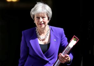 Prime Minister Theresa May is facing a new challenge following the resignation of two top Cabinet members, who denounced May’s plan for a soft Brexit(REUTERS) Prime Minister Theresa May is facing a new challenge following the resignation of two top Cabinet members, who denounced May’s plan for a soft Brexit(REUTERS)