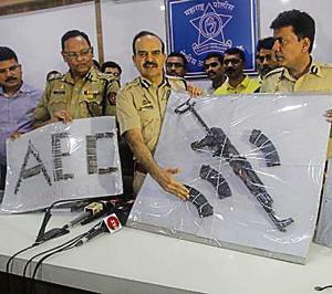 Thane anti-extortion cell (left) seized weapons, including an AK 56, from the home of a Dawood aide on Friday, a day after the arrest of two drug peddlers — Sanjay Shroff (top) and Jahid Kashmiri.(HT photo) Thane anti-extortion cell (left) seized weapons, including an AK 56, from the home of a Dawood aide on Friday, a day after the arrest of two drug peddlers — Sanjay Shroff (top) and Jahid Kashmiri.(HT photo)