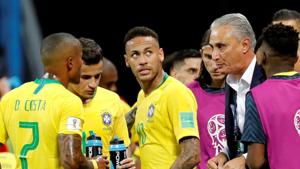 Brazil's Neymar looks on as coach Tite talks to Douglas Costa and team mates during the FIFA World Cup 2018 quarterfinal against Belgium.(REUTERS) Brazil's Neymar looks on as coach Tite talks to Douglas Costa and team mates during the FIFA World Cup 2018 quarterfinal against Belgium.(REUTERS)