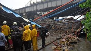 A section of a pedestrian bridge collapsed at Andheri railway station four days ago, killing Asmita Katkar, 34, who succumbed to her injuries on Saturday. She was the 34th victim in a rain-related incident this year.(HT File) A section of a pedestrian bridge collapsed at Andheri railway station four days ago, killing Asmita Katkar, 34, who succumbed to her injuries on Saturday. She was the 34th victim in a rain-related incident this year.(HT File)
