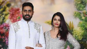 Abhishek Bachchan with his wife Aishwarya Rai Bachchan pose for a picture during the wedding reception of actor Sonam Kapoor and businessman Anand Ahuja in Mumbai on May 8, 2018.(AFP) Abhishek Bachchan with his wife Aishwarya Rai Bachchan pose for a picture during the wedding reception of actor Sonam Kapoor and businessman Anand Ahuja in Mumbai on May 8, 2018.(AFP)