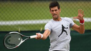 Serbia's Novak Djokovic practices at the All England Lawn Tennis Club in Wimbledon on Tuesday.(AFP) Serbia's Novak Djokovic practices at the All England Lawn Tennis Club in Wimbledon on Tuesday.(AFP)