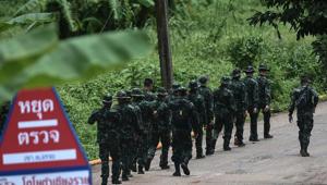 Thai soldiers walk into to the Tham Luang cave area as the operations continue for those still trapped inside the cave in Khun Nam Nang Non Forest Park in the Mae Sai district of Chiang Rai province.(AFP File Photo) Thai soldiers walk into to the Tham Luang cave area as the operations continue for those still trapped inside the cave in Khun Nam Nang Non Forest Park in the Mae Sai district of Chiang Rai province.(AFP File Photo)