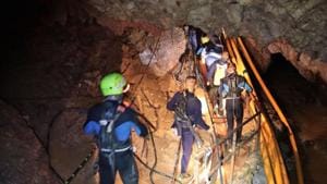 This handout photo released by the Royal Thai Navy on July 7, 2018 shows a group of Thai Navy divers in Tham Luang cave during rescue operations for the 12 boys and their football team coach.(AFP File Photo) This handout photo released by the Royal Thai Navy on July 7, 2018 shows a group of Thai Navy divers in Tham Luang cave during rescue operations for the 12 boys and their football team coach.(AFP File Photo)