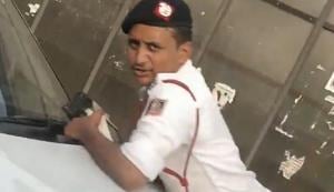 A traffic constable clings on to the bonnet of an SUV that rammed into a police barricade on Naraina flyover.(HT Video Grab) A traffic constable clings on to the bonnet of an SUV that rammed into a police barricade on Naraina flyover.(HT Video Grab)