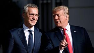 NATO secretary general Jens Stoltenberg (L) listens while US President Donald Trump makes a statement for the press before a meeting breakfast at the US chief of mission's residence in Brussels on Wednesday.(AFP Photo) NATO secretary general Jens Stoltenberg (L) listens while US President Donald Trump makes a statement for the press before a meeting breakfast at the US chief of mission's residence in Brussels on Wednesday.(AFP Photo)