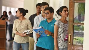 Delhi University aspirants queue outside an interview room to complete their admission process after filling their forms for the new academic session 2018-19 at Shri Ram College of Commerce in New Delhi on Monday, June 25, 2018.(Raj K Raj/HT PHOTO) Delhi University aspirants queue outside an interview room to complete their admission process after filling their forms for the new academic session 2018-19 at Shri Ram College of Commerce in New Delhi on Monday, June 25, 2018.(Raj K Raj/HT PHOTO)