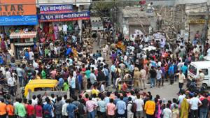 Police personnel and people outside the street leading to the house, where 11 members of a family were found hanging from an iron grill, in Burari area of New Delhi.(PTI File Photo) Police personnel and people outside the street leading to the house, where 11 members of a family were found hanging from an iron grill, in Burari area of New Delhi.(PTI File Photo)