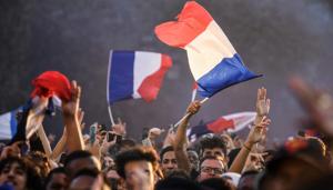 People cheer and wave French flags as they gather at a fan zone in Paris during their FIFA World Cup 2018 match against Belgium.(AFP) People cheer and wave French flags as they gather at a fan zone in Paris during their FIFA World Cup 2018 match against Belgium.(AFP)