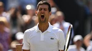 Serbia's Novak Djokovic celebrates after beating Japan's Kei Nishikori 6-3, 3-6, 6-2, 6-2 during their men's singles quarter-finals match in Wimbledon.(AFP)