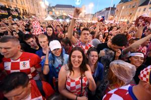 Croatia's supporters react as they watch on a giant screen the Russia 2018 World Cup semi-final football match between Croatia and England, at the main square in Zagreb, Croatia on July 11, 2018(AFP) Croatia's supporters react as they watch on a giant screen the Russia 2018 World Cup semi-final football match between Croatia and England, at the main square in Zagreb, Croatia on July 11, 2018(AFP)