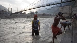 In this photograph taken on July 11, 2018, Hindu devotees bathe in the Bhagiathi River in Uttarkashi, in Uttarakhand.(AFP) In this photograph taken on July 11, 2018, Hindu devotees bathe in the Bhagiathi River in Uttarkashi, in Uttarakhand.(AFP)