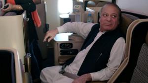 Ousted Pakistani Prime Minister Nawaz Sharif sits on a plane after landing at the Allama Iqbal International Airport in Lahore, Pakistan, July 13, 2018.(REUTERS) Ousted Pakistani Prime Minister Nawaz Sharif sits on a plane after landing at the Allama Iqbal International Airport in Lahore, Pakistan, July 13, 2018.(REUTERS)