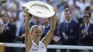 Germany's Angelique Kerber lifts the trophy after winning the women's singles final match against Serena Williams of the United States, at the Wimbledon Tennis Championships, in London, Saturday July 14, 2018.(AP) Germany's Angelique Kerber lifts the trophy after winning the women's singles final match against Serena Williams of the United States, at the Wimbledon Tennis Championships, in London, Saturday July 14, 2018.(AP)