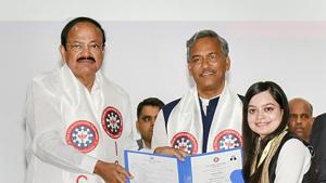 Vice-president M Venkaiah Naidu presents a certificate to a student during the convocation of ICFAI University in Dehradun on Saturday. Uttarakhand chief minister Trivendra Singh Rawat is present.(PTI Photo) Vice-president M Venkaiah Naidu presents a certificate to a student during the convocation of ICFAI University in Dehradun on Saturday. Uttarakhand chief minister Trivendra Singh Rawat is present.(PTI Photo)