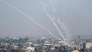 A picture taken on July 14, 2018 shows Palestinian rockets being fired from Gaza City towards Israel. Israel's military said it had launched air strikes targeting Hamas in the Gaza Strip on July 14 as rockets and mortars were lobbed into southern Israel from the blockaded Palestinian enclave.(AFP) A picture taken on July 14, 2018 shows Palestinian rockets being fired from Gaza City towards Israel. Israel's military said it had launched air strikes targeting Hamas in the Gaza Strip on July 14 as rockets and mortars were lobbed into southern Israel from the blockaded Palestinian enclave.(AFP)
