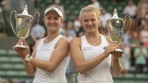 Barbora Krejcikova (CZE) and Katerina Siniakova (CZE) pose with their trophies after winning Wimbledon women’s doubles final on at All England Lawn and Croquet Club.(USA TODAY Sports) Barbora Krejcikova (CZE) and Katerina Siniakova (CZE) pose with their trophies after winning Wimbledon women’s doubles final on at All England Lawn and Croquet Club.(USA TODAY Sports)