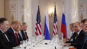 US President Donald Trump, second from left, and U.S. Secretary of State Mike Pompeo, left, attend a working lunch with Russian President Vladimir Putin, third from right, during their meeting at the Presidential Palace in Helsinki, Finland, Monday, July 16, 2018.(AP Photo) US President Donald Trump, second from left, and U.S. Secretary of State Mike Pompeo, left, attend a working lunch with Russian President Vladimir Putin, third from right, during their meeting at the Presidential Palace in Helsinki, Finland, Monday, July 16, 2018.(AP Photo)