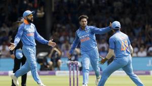 London: India's Kuldeep Yadav, center, celebrates taking the wicket of England's Jonny Bairstow with India captain Virat Kohli, left, during the one day cricket match between England and India at Lord's cricket ground in London.(AP) London: India's Kuldeep Yadav, center, celebrates taking the wicket of England's Jonny Bairstow with India captain Virat Kohli, left, during the one day cricket match between England and India at Lord's cricket ground in London.(AP)