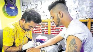 The origin of the word tattoo can be traced to the Tahitian ‘tatu’, meaning to mark something.(Keshav Singh/HT, Instagram) The origin of the word tattoo can be traced to the Tahitian ‘tatu’, meaning to mark something.(Keshav Singh/HT, Instagram)