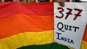 In this file photo taken on December 15, 2013, a gay rights activist holds up a placard against Section 377 during a protest against the Supreme Court ruling reinstating a ban on gay sex, in Kolkata.(AFP File) In this file photo taken on December 15, 2013, a gay rights activist holds up a placard against Section 377 during a protest against the Supreme Court ruling reinstating a ban on gay sex, in Kolkata.(AFP File)