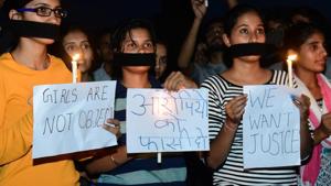 A candle light protest in Bikaner against the rape of an eight-year-old girl in MP’s Mandsaur, at Bikaner on June 30,2018.(PTI File Photo) A candle light protest in Bikaner against the rape of an eight-year-old girl in MP’s Mandsaur, at Bikaner on June 30,2018.(PTI File Photo)