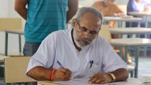 BJP MLA Phool Singh Meena is appearing for his BA first year exams. He had to drop out of school to take care of his family.(HT Photo) BJP MLA Phool Singh Meena is appearing for his BA first year exams. He had to drop out of school to take care of his family.(HT Photo)