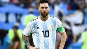 Carlos Tevez wants Lionel Messi to continue playing for Argentina despite the World Cup poor show.(AFP) Carlos Tevez wants Lionel Messi to continue playing for Argentina despite the World Cup poor show.(AFP)