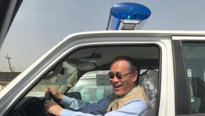 Japanese ambassador Fumio Iwai riding in a pick-up truck during a handover ceremony of vehicles provided by Japan to the Iraqi police at an unspecified location in Iraq.(AFP/Facebook page of the Embassy of Japan to Iraq) Japanese ambassador Fumio Iwai riding in a pick-up truck during a handover ceremony of vehicles provided by Japan to the Iraqi police at an unspecified location in Iraq.(AFP/Facebook page of the Embassy of Japan to Iraq)