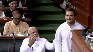 Prime Minister Narendra Modi gestures as Congress President Rahul Gandhi walks away after hugging him in the Lok Sabha during a no-confidence motion debate in the Monsoon Session of Parliament, in New Delhi on Friday.(PTI photo) Prime Minister Narendra Modi gestures as Congress President Rahul Gandhi walks away after hugging him in the Lok Sabha during a no-confidence motion debate in the Monsoon Session of Parliament, in New Delhi on Friday.(PTI photo)