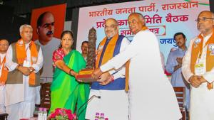 Bhartiya Janta Party president Amit Shah with Rajasthan chief minister Vasundhara Raje during the closing ceremony of state working committee meeting, in Jaipur on July 21.(PTI Photo) Bhartiya Janta Party president Amit Shah with Rajasthan chief minister Vasundhara Raje during the closing ceremony of state working committee meeting, in Jaipur on July 21.(PTI Photo)