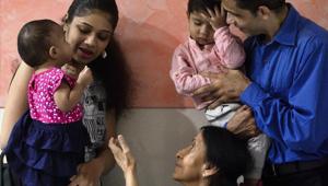 India’s first test-tube baby, Harsha Shah, with her husband Divyapal, two children and Dr Indira Hinduja (seated), who pioneered the technique in India.(Anshuman Poyrekar / HT Photo) India’s first test-tube baby, Harsha Shah, with her husband Divyapal, two children and Dr Indira Hinduja (seated), who pioneered the technique in India.(Anshuman Poyrekar / HT Photo)