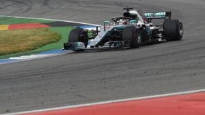 Mercedes' British driver Lewis Hamilton steers his car during the German Formula One Grand Prix at the Hockenheim racing circuit.(AFP) Mercedes' British driver Lewis Hamilton steers his car during the German Formula One Grand Prix at the Hockenheim racing circuit.(AFP)