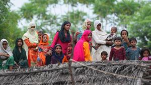 Relatives and neighbours of Rakhbar Khan was allegedly lynched to death on suspicion of cow-smuggling in Alwar's Lalawandi area.(Sanjeev Verma/HT Photo) Relatives and neighbours of Rakhbar Khan was allegedly lynched to death on suspicion of cow-smuggling in Alwar's Lalawandi area.(Sanjeev Verma/HT Photo)