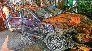 Cops from Versova police station inspect the damaged Jaguar at Versova on Monday.(Shashi S Kashyap/HT Photo) Cops from Versova police station inspect the damaged Jaguar at Versova on Monday.(Shashi S Kashyap/HT Photo)