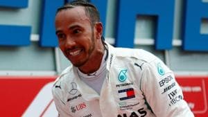 Mercedes' Lewis Hamilton celebrates after winning the German Grand Prix.(REUTERS)