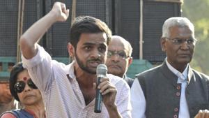 File photo of JNU student Umar Khalid (holding the mike) at a protest march in New Delhi on March 4, 2017. Khalid claims the university didn’t allow him to submit his PhD thesis despite instructions from Delhi HC.(Raj K Raj/HT File Photo) File photo of JNU student Umar Khalid (holding the mike) at a protest march in New Delhi on March 4, 2017. Khalid claims the university didn’t allow him to submit his PhD thesis despite instructions from Delhi HC.(Raj K Raj/HT File Photo)