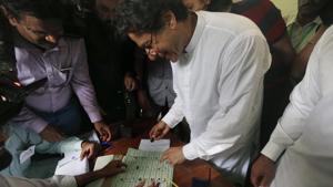 Pakistani politician Imran Khan, chief of Pakistan Tehreek-e-Insaf party, casts his vote at a polling station for the parliamentary elections in Islamabad, Pakistan, on Wednesday.(AP photo)