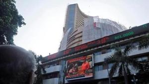 People watch a large screen displaying India's benchmark share index on the facade of the Bombay Stock Exchange (BSE) building in Mumbai.(Reuters File Photo) People watch a large screen displaying India's benchmark share index on the facade of the Bombay Stock Exchange (BSE) building in Mumbai.(Reuters File Photo)
