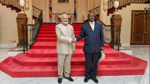 Prime Minister Narendra Modi shakes hands with Ugandan President Yoweri K. Museveni, at the State House in Uganda on Tuesday.(PTI Photo) Prime Minister Narendra Modi shakes hands with Ugandan President Yoweri K. Museveni, at the State House in Uganda on Tuesday.(PTI Photo)
