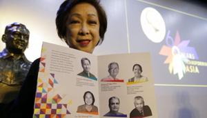 Ramon Magsaysay Award Foundation president Carmencita Abella poses with pictures of this year’s awardees, regarded as an Asian version of the Nobel Peace Prize, in Manila, Philippines, Thursday.(AP) Ramon Magsaysay Award Foundation president Carmencita Abella poses with pictures of this year’s awardees, regarded as an Asian version of the Nobel Peace Prize, in Manila, Philippines, Thursday.(AP)