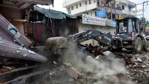 Dehradun, India - July 19 :: A JCB machine removing encroachments at Dharampur area in Dehradun, India, on Wednesday, July 18, 2018. (Photo by Vinay Santosh Kumar/HT) Dehradun, India - July 19 :: A JCB machine removing encroachments at Dharampur area in Dehradun, India, on Wednesday, July 18, 2018. (Photo by Vinay Santosh Kumar/HT)