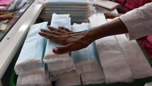 Employees of Myna Mahila Foundation prepare sanitary pads at their office in Mumbai. The Centre withdrew GST on sanitary pads as a part of slew of changes to its tax regime ahead of 2019 elections.(AFP File Photo) Employees of Myna Mahila Foundation prepare sanitary pads at their office in Mumbai. The Centre withdrew GST on sanitary pads as a part of slew of changes to its tax regime ahead of 2019 elections.(AFP File Photo)