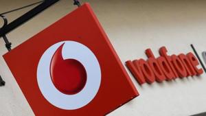 Branding hangs outside a Vodafone shop in Oxford, Britain, May 16, 2017. REUTERS/Toby Melville/File Photo(REUTERS File Photo) Branding hangs outside a Vodafone shop in Oxford, Britain, May 16, 2017. REUTERS/Toby Melville/File Photo(REUTERS File Photo)