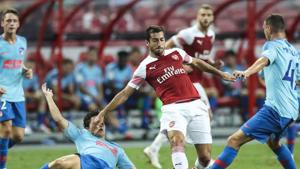 Arsenal's Henrikh Mkhitaryan, center, controls the ball against Atletico Madrid's Andres Solano, left, and Mikel Carro during the International Champions Cup match between Arsenal and Atletico Madrid in Singapore.(AP) Arsenal's Henrikh Mkhitaryan, center, controls the ball against Atletico Madrid's Andres Solano, left, and Mikel Carro during the International Champions Cup match between Arsenal and Atletico Madrid in Singapore.(AP)