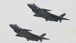 A pair of J-20 stealth fighter jets fly at the China's International Aviation and Aerospace Exhibition in Zhuhai, China's Guangdong province.(AP Photo) A pair of J-20 stealth fighter jets fly at the China's International Aviation and Aerospace Exhibition in Zhuhai, China's Guangdong province.(AP Photo)